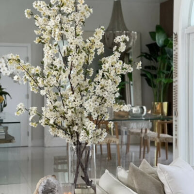 Cherry blossoms in a 40 cm glass cylinder.