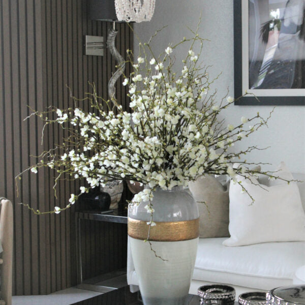 Goddess Vase with Cherry Blossom Branches.